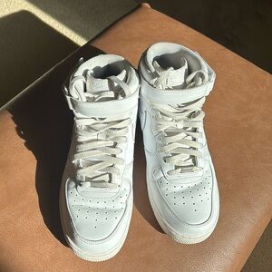 High top Air Jordan with velcro strap.